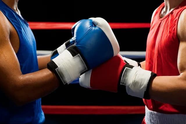 Boxers Touching Gloves Before Fight
